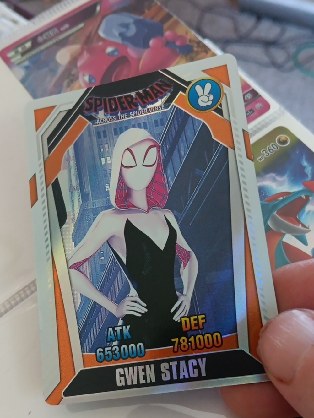 Spiderman Gwen Stacy Trading Card — White, Black, Orange, Red